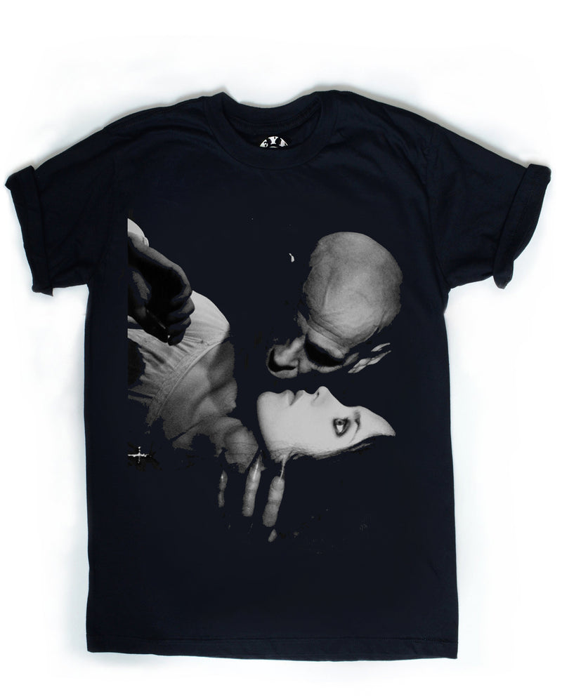 Black t-shirt with a graphic design of a skull and a face on a white background