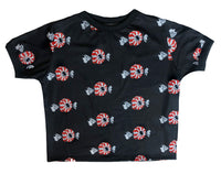 Black crop top with candy pattern on a white background