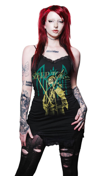 Person wearing a tank top with a graphic design on a white background