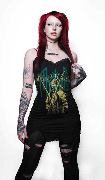 Person wearing a black tank top with a graphic design on a white background