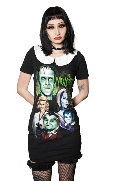 Person wearing a black t-shirt with 'The Munsters' graphic design on a white background