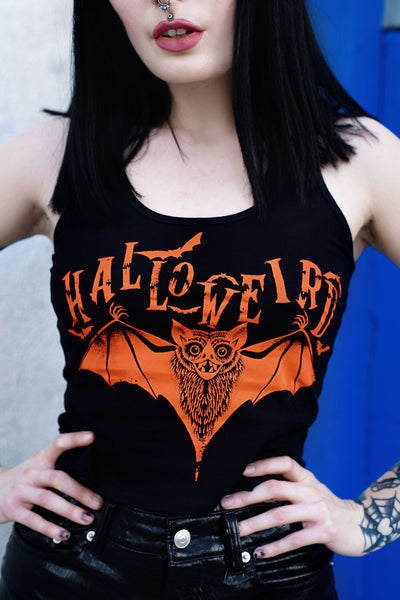 Black cropped tank with orange font that reads "Halloweird" with orange bats