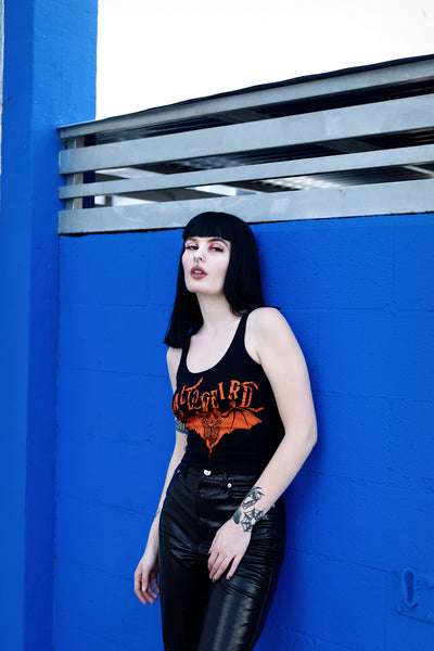 Black cropped tank with orange font that reads "Halloweird" with orange bats