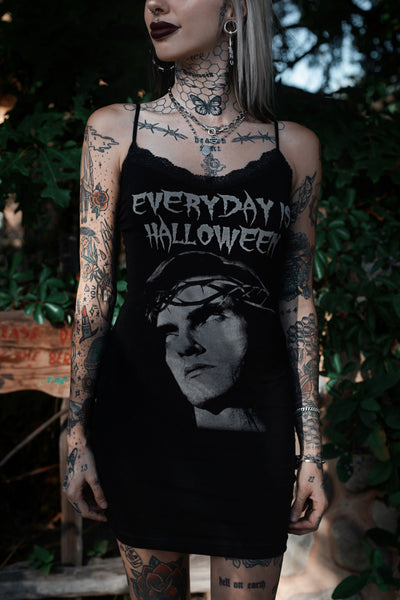 Black thin strap mini dress with black lace trim neckline. Features white image of Peter Steele with eyes rolled up wearing a thorn crown. White inscription reads "EVERYDAY IS HALLOWEEN"