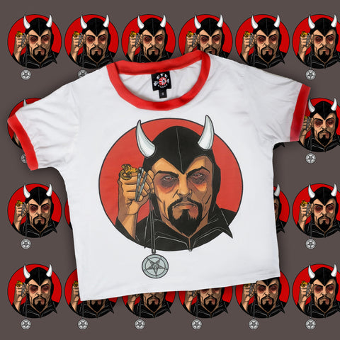 solid white ringer tee with red trim and Anton LaVey in black costume and horns holding pentagram necklace, red background print
