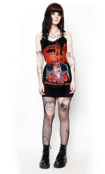 black mini dress with thin straps and black lace trim neckline. Inscription reads "Death" and "Scream Bloody Gore" in red. Features skeleton wearing cloak sitting on throne with three cloaked skeletons sitting on steps below holding up goblets.