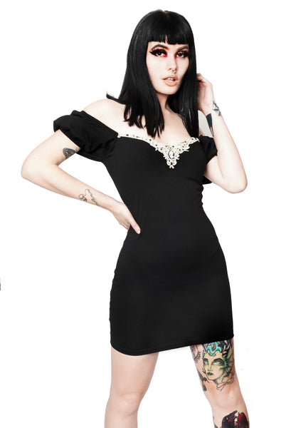Black mini dress with puff off shoulder sleeves and embellished white Victorian style neckline.