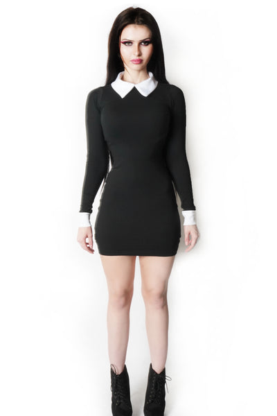 Solid black long sleeve mini dress with white polo style collar and white trim wrist cuffs