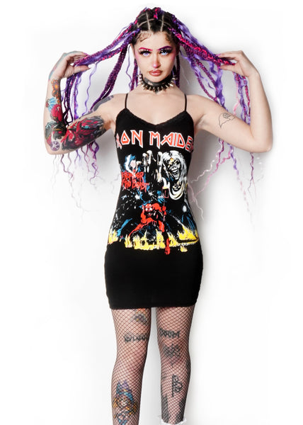 Black thin strap mini dress with black lace trim neckline. Features monster reaching one hand forward with red devil below. Inscription in red reads "IRON MAIDEN" and "Number of the beast".