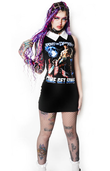 Black sleeveless mini dress with white collar. Army of Darkness print. Print features man with bloody chainsaw and moon behind him. Inscription reads "Come Get Some" and "Army of Darkness" in white and blue.
