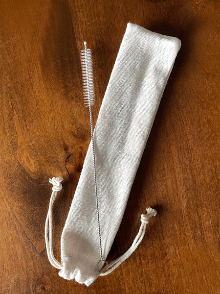 White straw brush cleaner with white storage bag