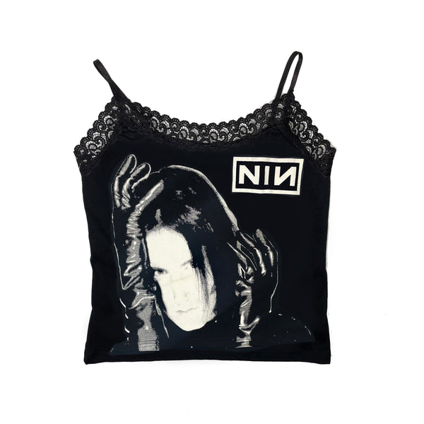 Black thin strap tank with lace trim neckline. White print features man with black gloves holding his face. Inscription reads "NIN" in white.