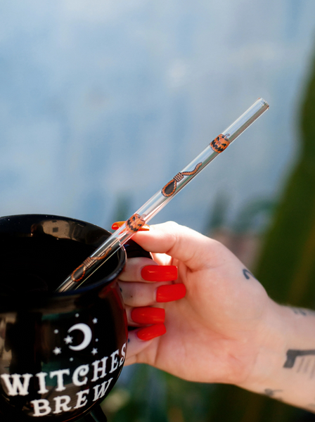 pumpkin designs on glass straw.