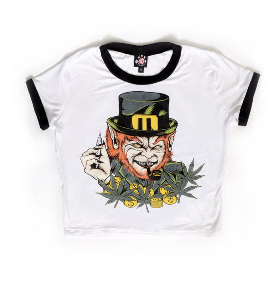 White ringer tee with black trim. Features image of evil Leprechaun with red hair and sharp teeth wearing green while holding a joint with black and yellow pipe in mouth. Yellow coins and green marijuana leaves in foreground.