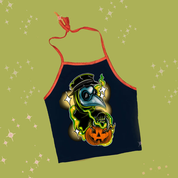 Black halter top with thin orange trim and tie up straps. Features image of plague doctor wearing bird like plague mask holding Jack o lantern basket. Green smoke in background of image.