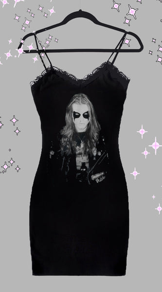 Black dress with thin straps and black lace trim neckline. Black and white print shows man with corpse paint