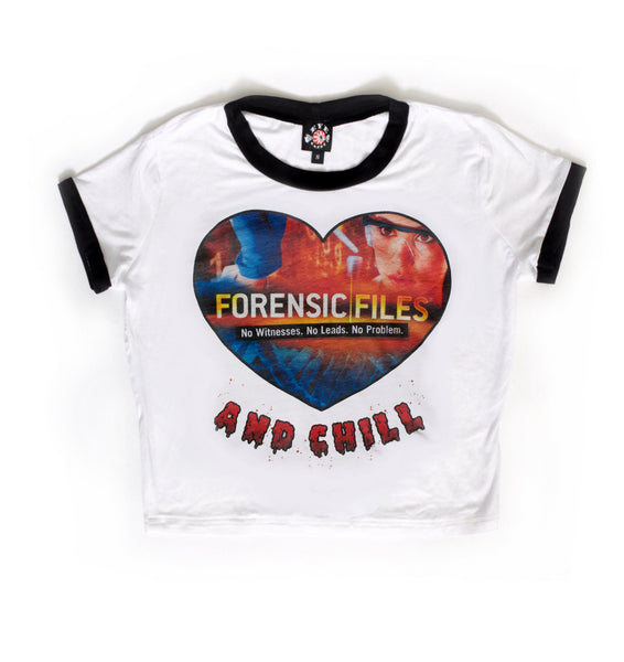 White ringer tee with black trim. Features lab scientist and "Forensic Files and Chill" written. Inscription also reds "No Witnesses, No Leads, No Problem."