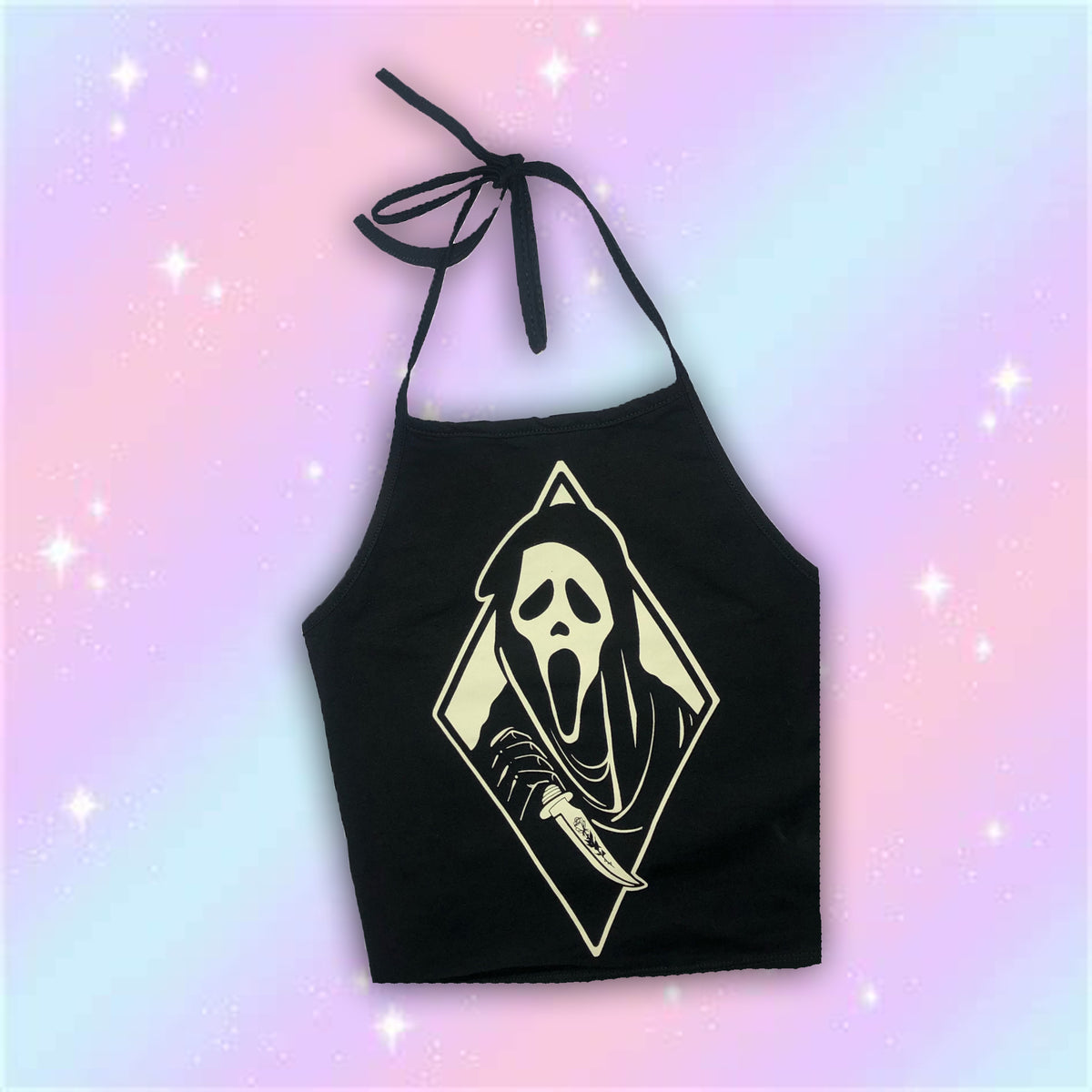 Black halter top with thin black straps to tie around neck. Features white diamond-shaped border featuring Ghostface from the movie Scream holding knife.