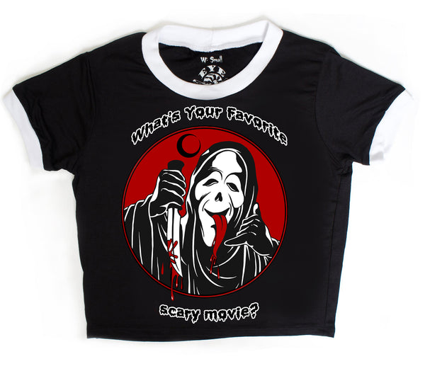 Black ringer tee with white trim. Features Ghostface from the movie Scream sticking his tongue and and holding a bloody knife. Black crescent moon above Ghostface. Inscription reads "What's Your Favorite Scary Movie?" in black and white.