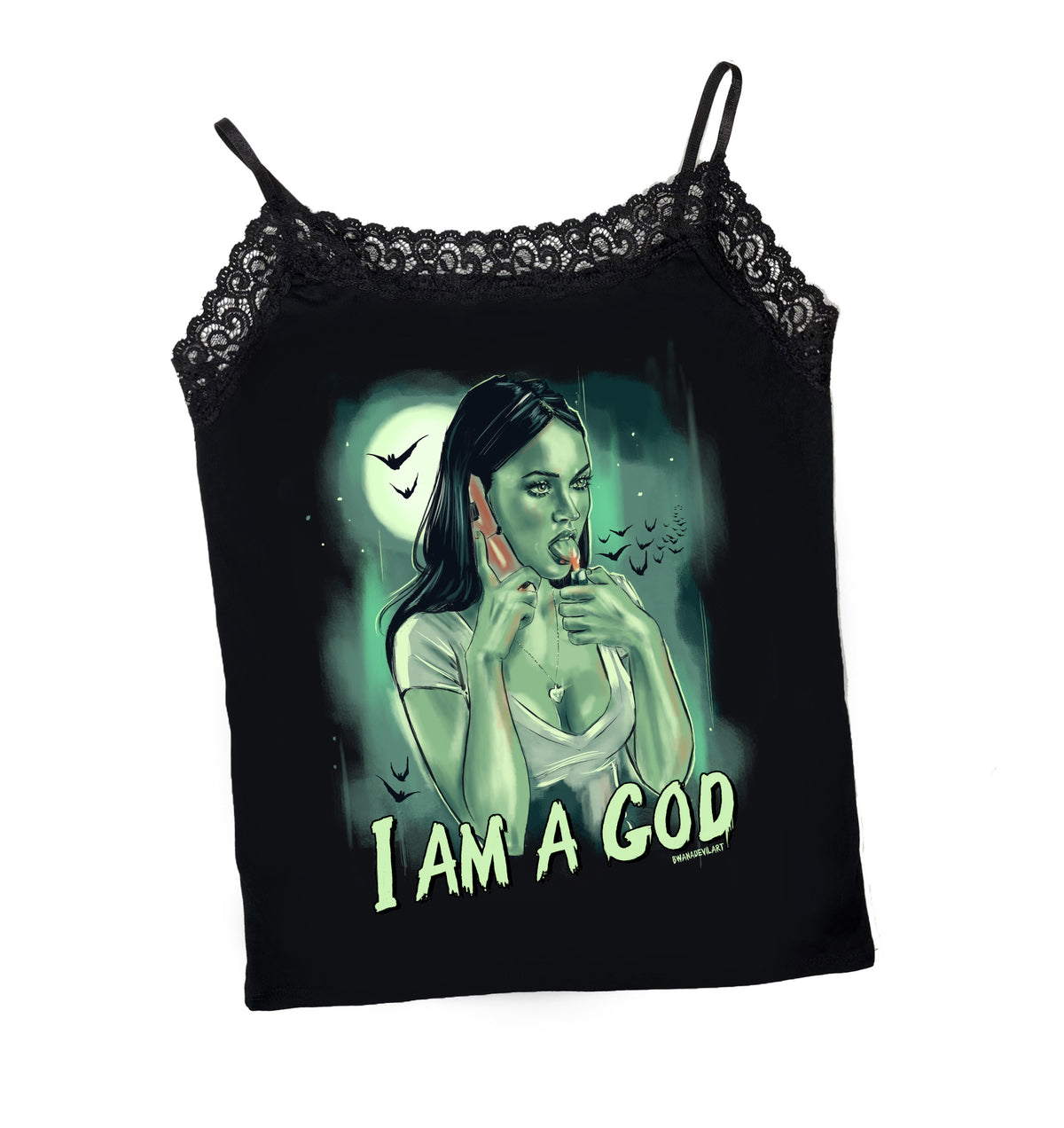 Black thin strap tank top with black lace trim neckline. Features green print image of Jennifer from the movie Jennifer's body holding a cell phone to her ear and a lighter to her tongue. Full moon and bats in background. Inscription reads "I AM A GOD" in green.