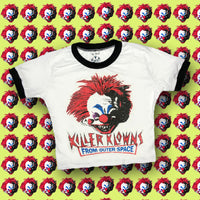 White ringer tee with black trim. Features image of evil clown head. Inscription reads "KILLER KLOWNS" in red and "FROM OUTER SPACE" in blue.