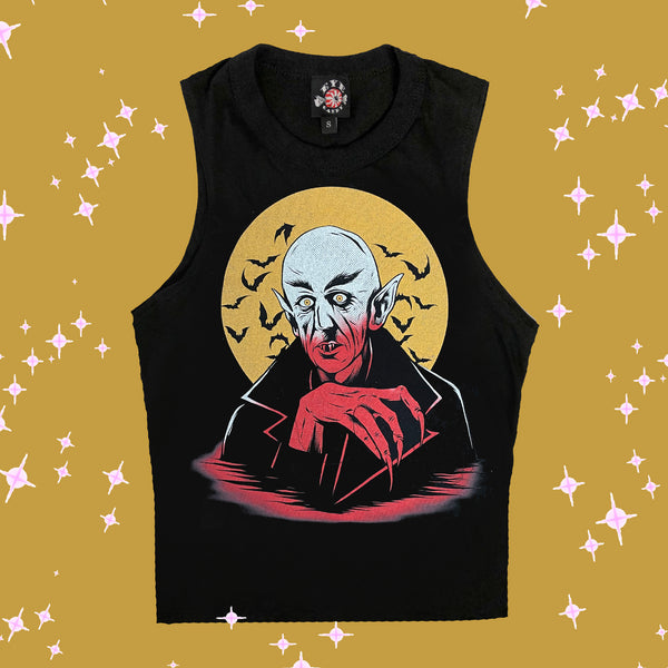 Black high neck tank top. Features white and orange image of vampire. Yellow full moon and black bats in background of image.