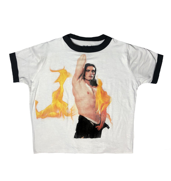 White ringer tee with black trim. Features image of Peter Steele with his shirt off and black pants unzipped. Image on shirt also contain flames in front and behind Peter Steele.
