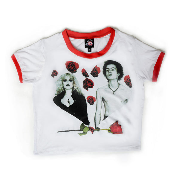 White ringer tee with red trim. Features black and white image of Sid Vicious and his girlfriend Nancy Spungen wth red roses in background. Image inside heart shape with single red rose under heart.