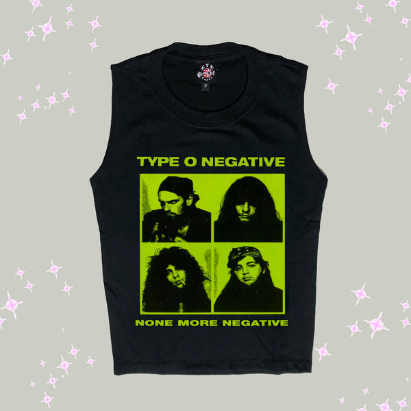 Black high neck sleeveless tank top. Features green print of four squares with pictures of the musicians from the band Type O Negative in each square. Inscription reads "TYPE O NEGATIVE" and "NONE MORE NEGATIVE" in green.