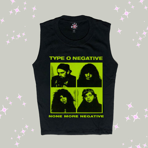 Black high neck sleeveless tank top. Features green print of four squares with pictures of the musicians from the band Type O Negative in each square. Inscription reads "TYPE O NEGATIVE" and "NONE MORE NEGATIVE" in green.